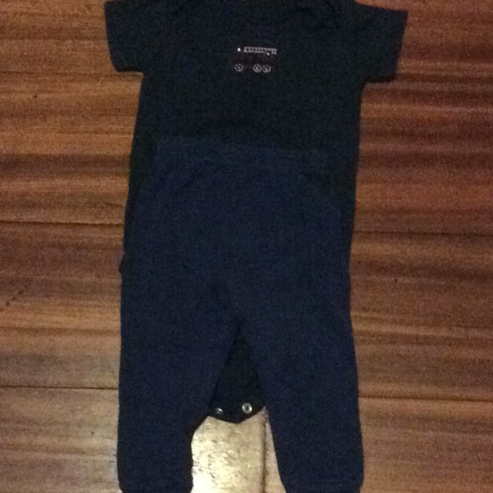 A little fire truck on outfit really cute.